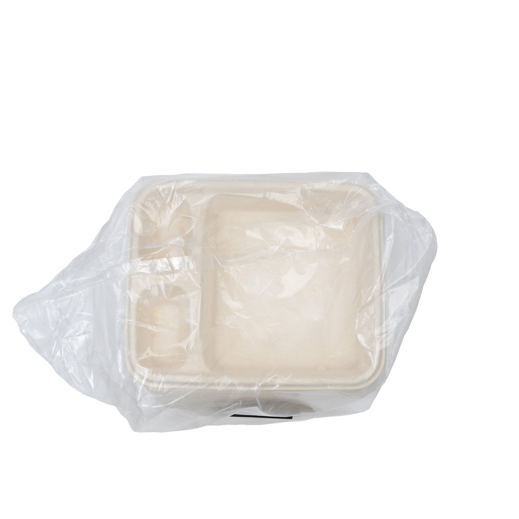 Stack of fiber nacho trays wrapped in a clear plastic on a white background
