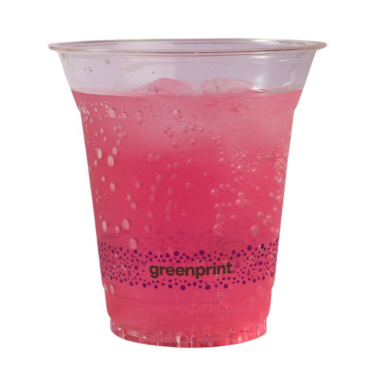 Clear compostable cup with pink drink and 'greenprint' logo on a white background