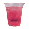 Clear compostable cup with pink drink and 'greenprint' logo on a white background