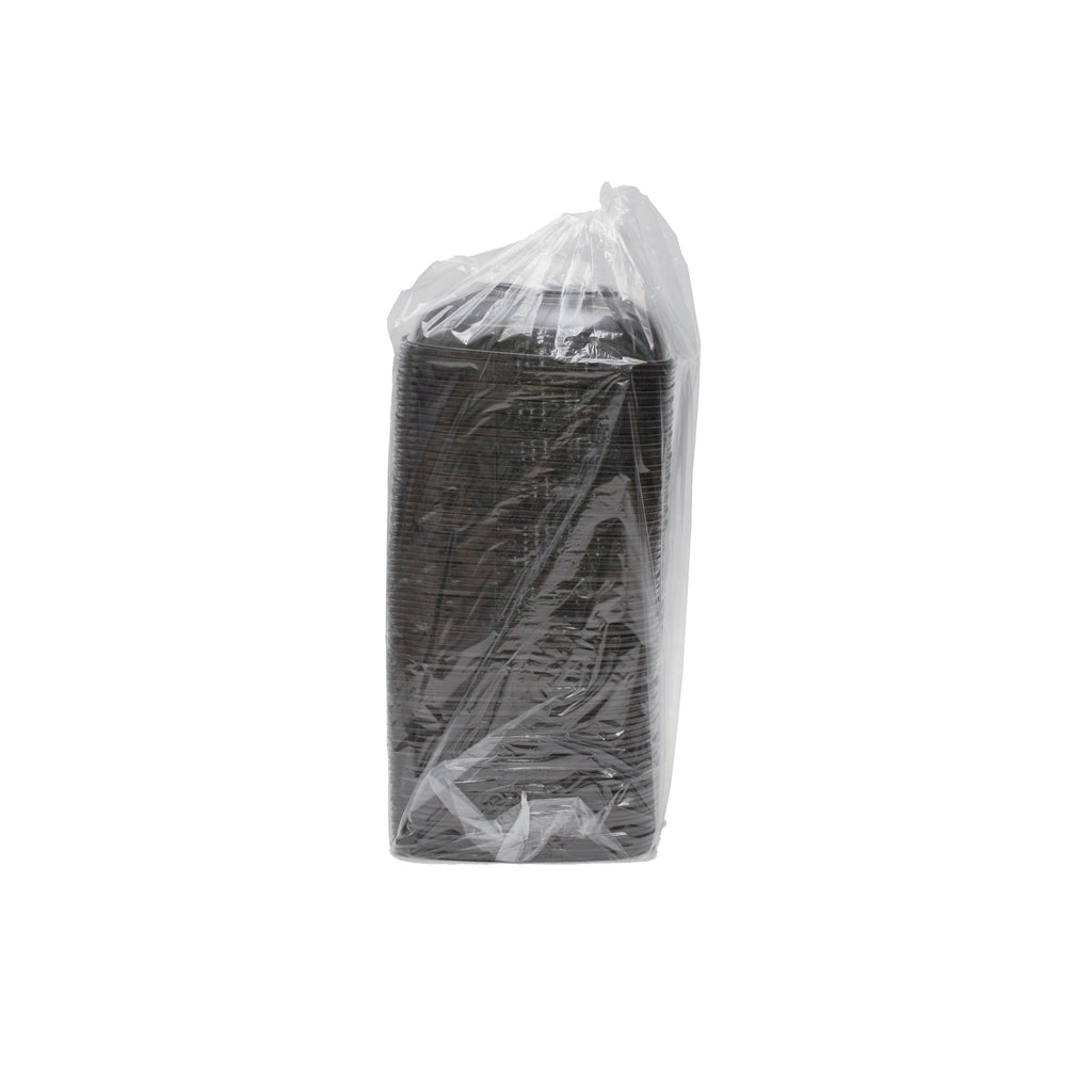 Black plastic square bowls in a clear plastic bag on a white background
