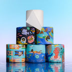 Colorful toilet paper rolls with artistic designs on a blue background