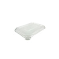 Clear plastic food container lid on a white background