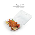 An image of a large clear clamshell, highlighting the rippled walls of the container and lid.