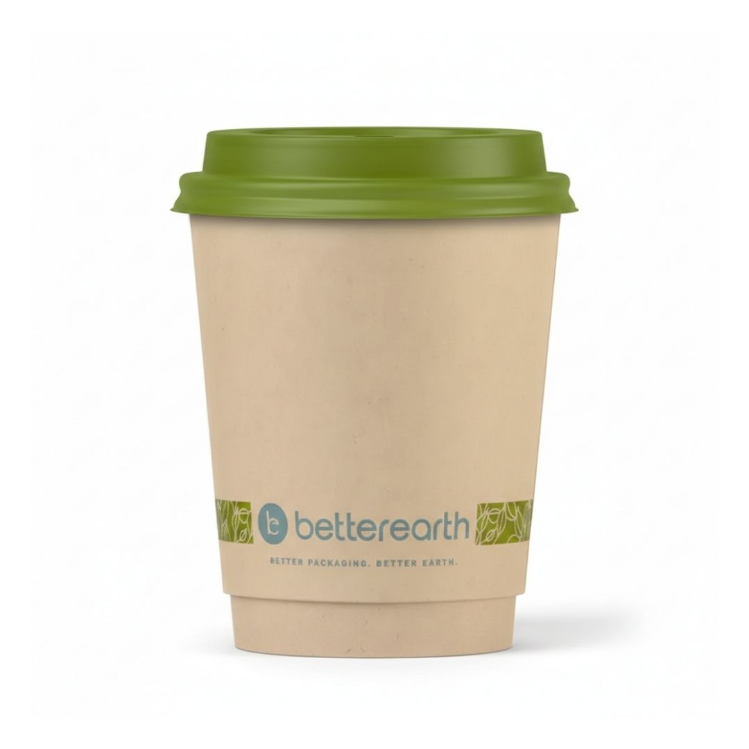 Compostable coffee cup with green lid on a white background