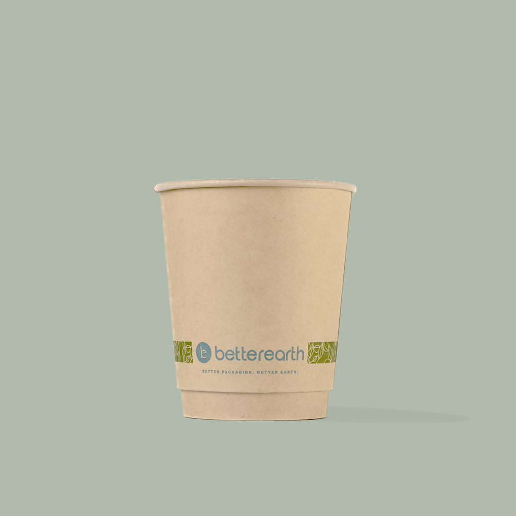 Compostable paper cup with 'betterearth' logo on a light green background