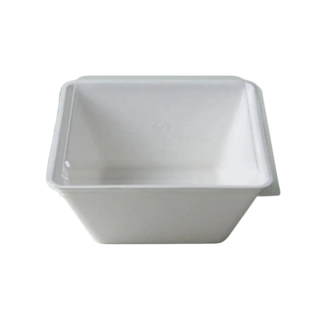 White disposable bowl with a lid on a white background