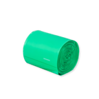 Roll of green home compostable bags on a white background