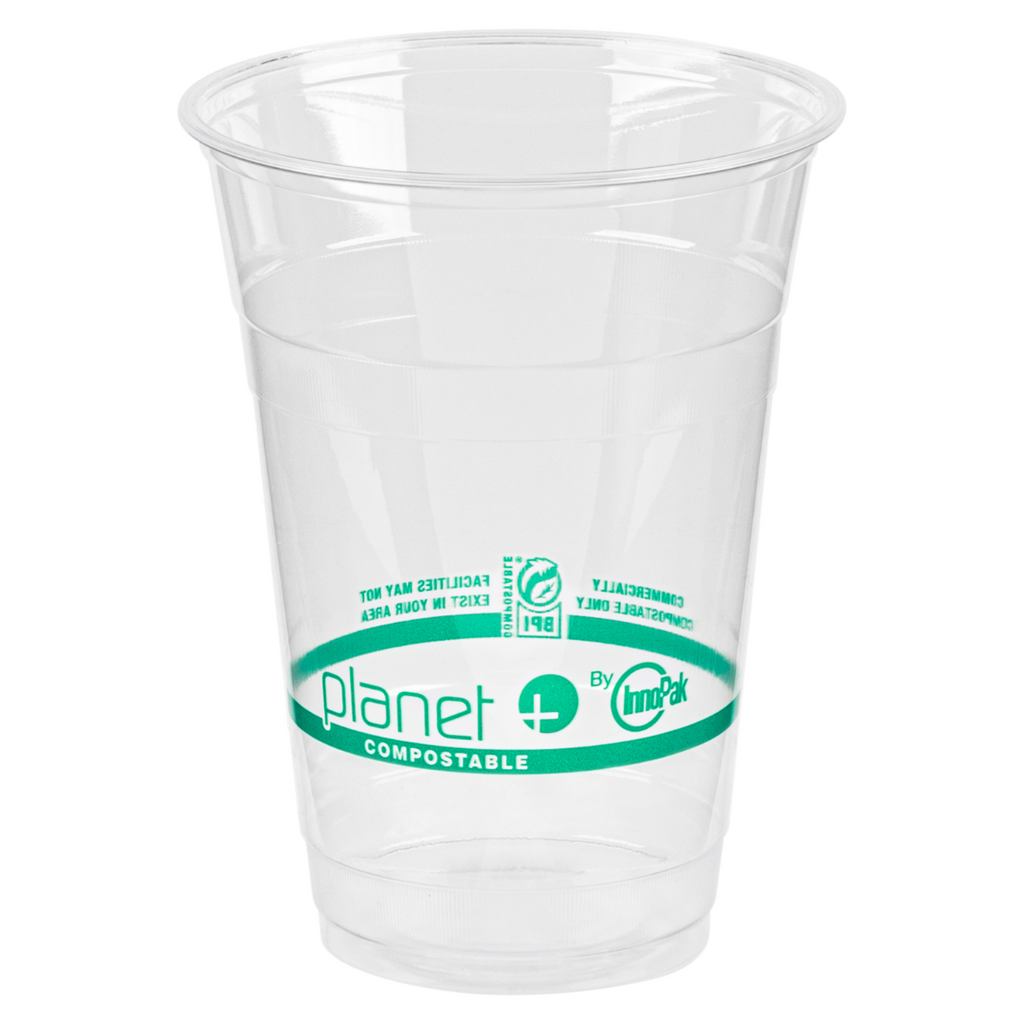 Clear compostable cup with green label on a white background