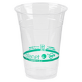 Clear compostable cup with green label on a white background