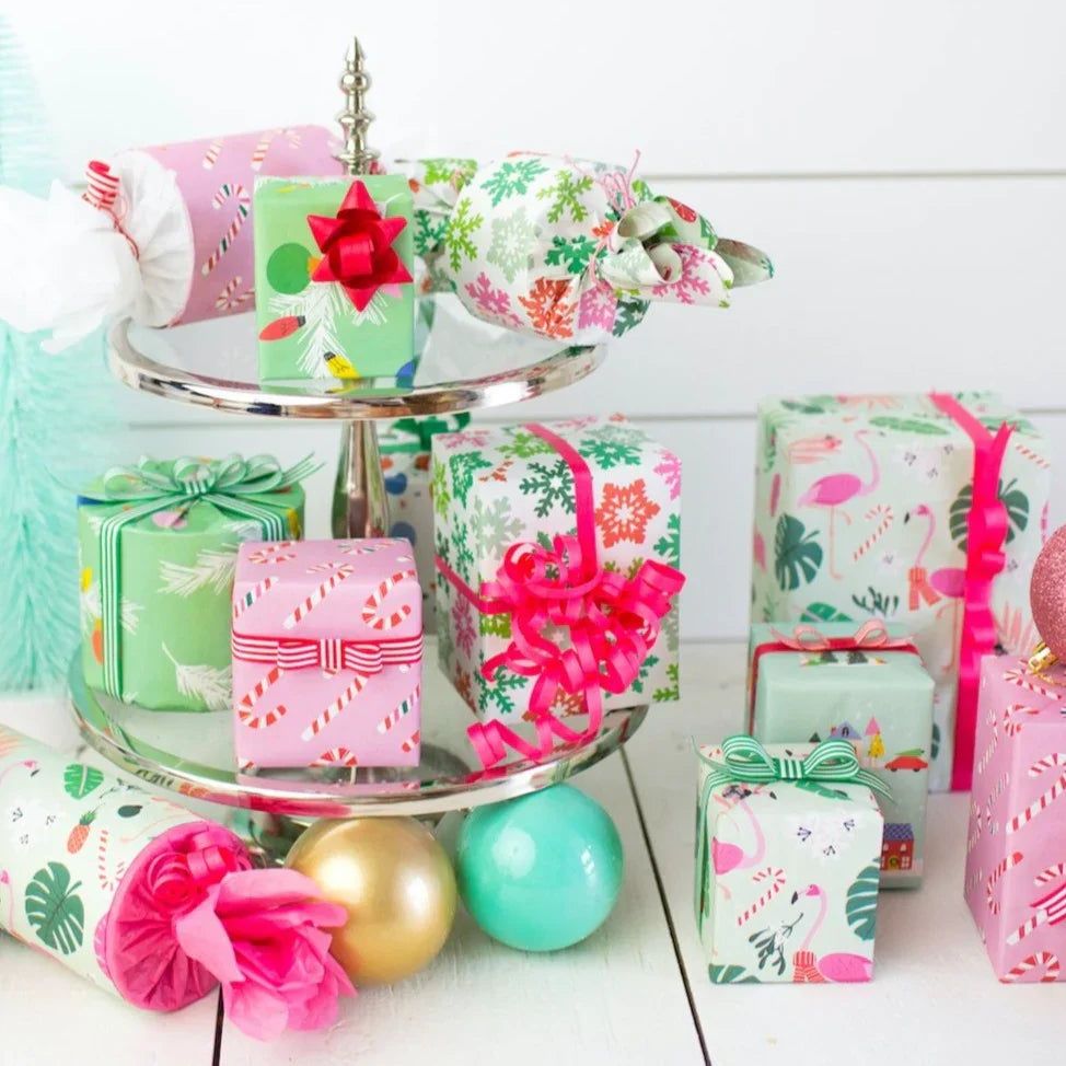 Many gifts wrapped in eco-friendly paper with cotton ribbons in many colors.