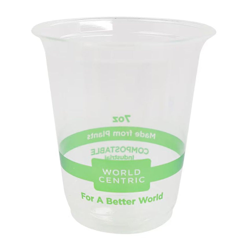 Clear compostable plastic cup with green label on a white background