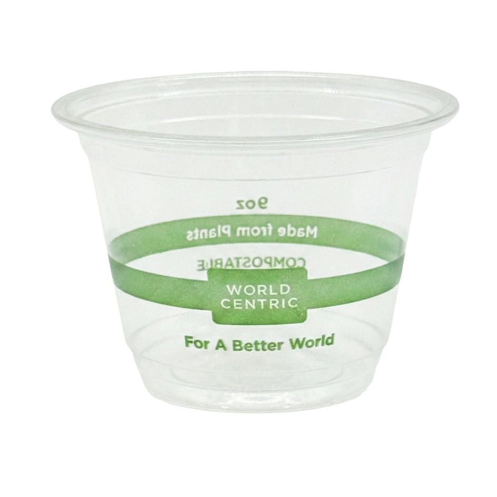 Clear plastic cup with green band and text on a white background