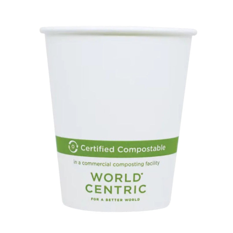 White paper cup with green certification label on a white background