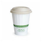 Compostable coffee cup with World Centric branding on a white background