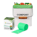 Compost bin with compostable bags and packaging on a white background