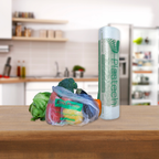 Plastechm product on a kitchen counter with vegetables and a bag of groceries.