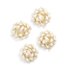 Four cream-colored ribbon loops on a white background
