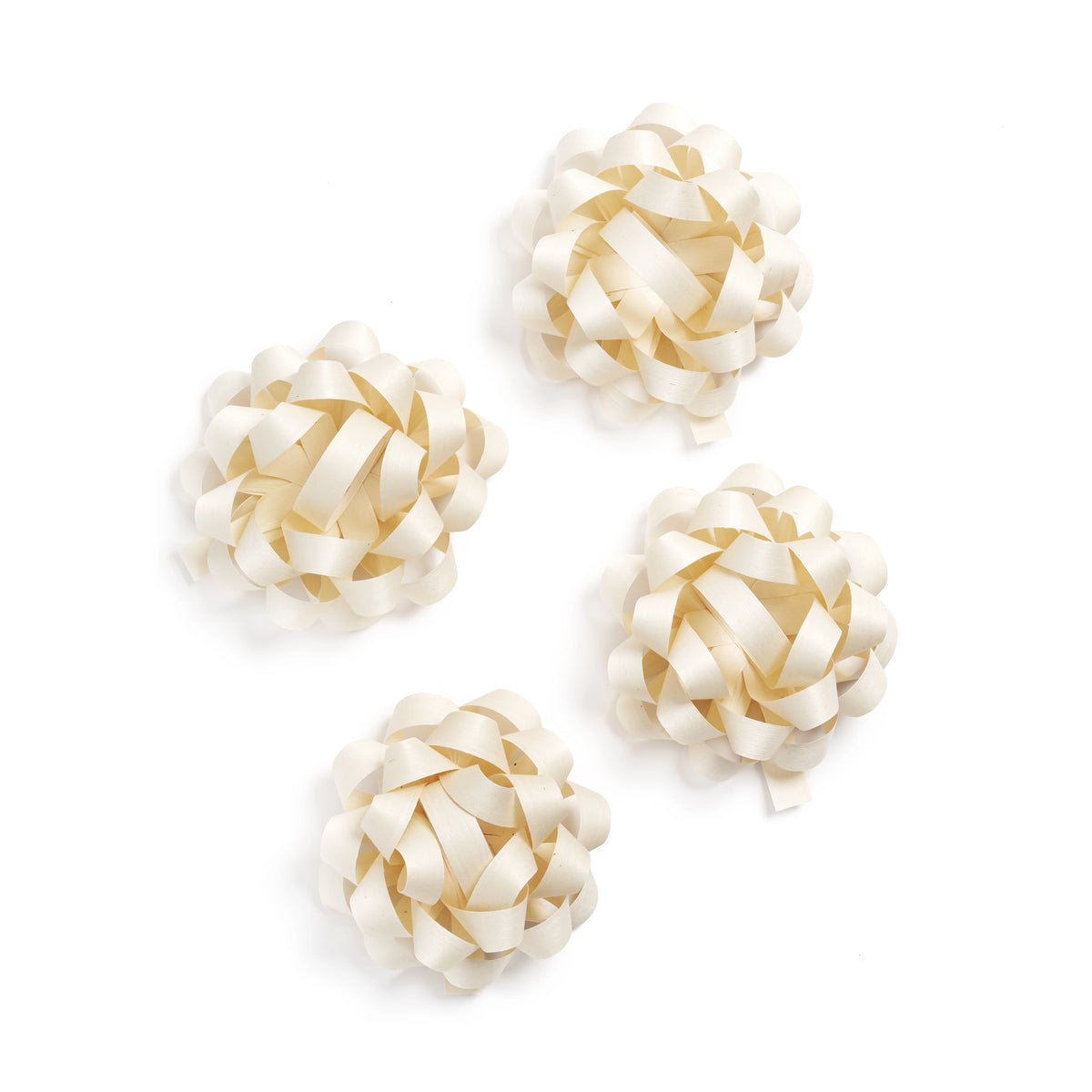 Four cream-colored ribbon loops on a white background