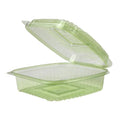 Green plastic food container with lid on a white background