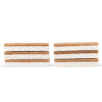 Scrubbing sponges with brown and white side stacked on a white background