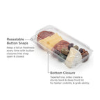 Transparent food container with various foods labeled for features on a white background