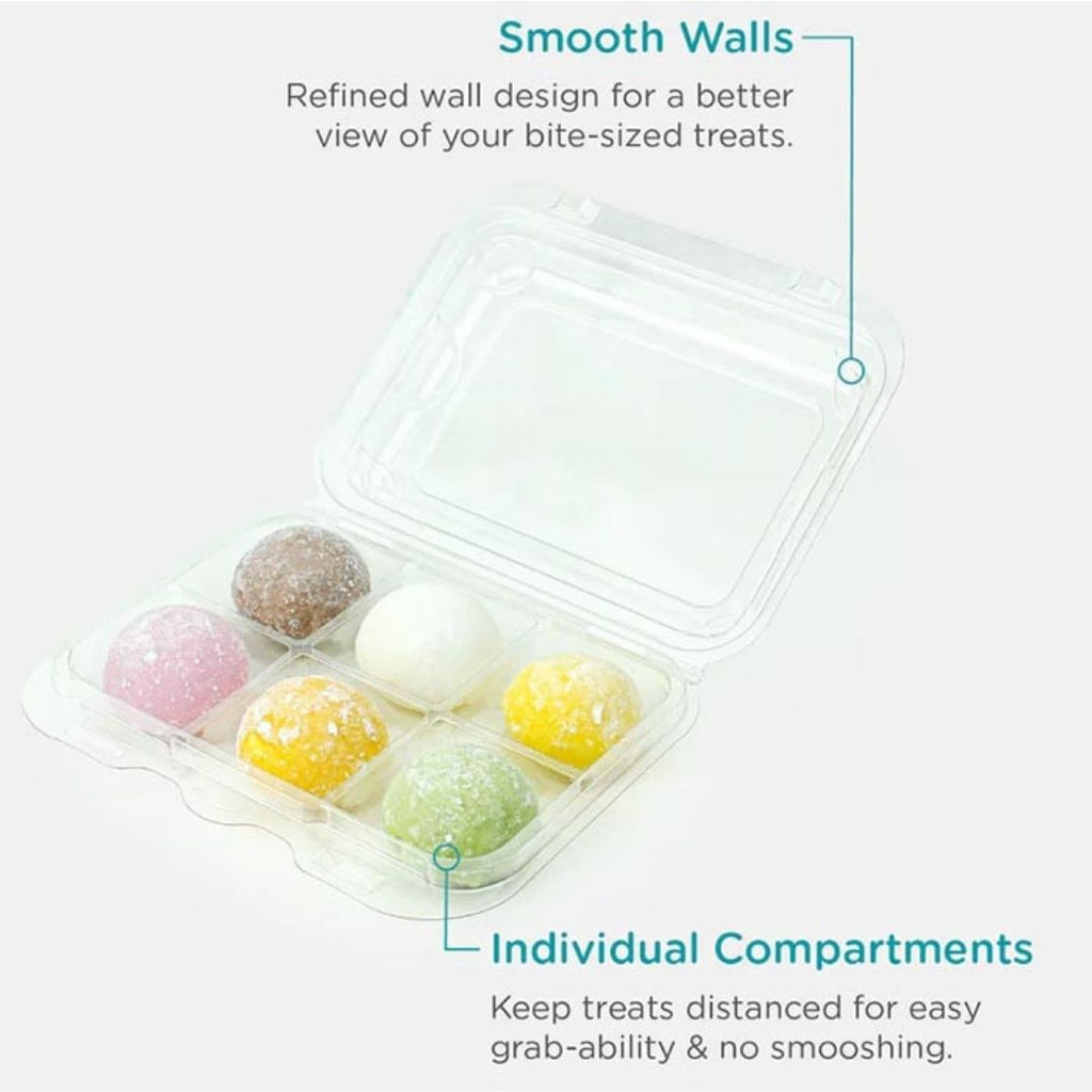 Clear container with individually compartmented bite-sized treats on a white background