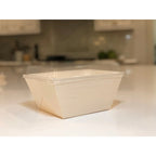 Wood tray with lid on a kitchen counter
