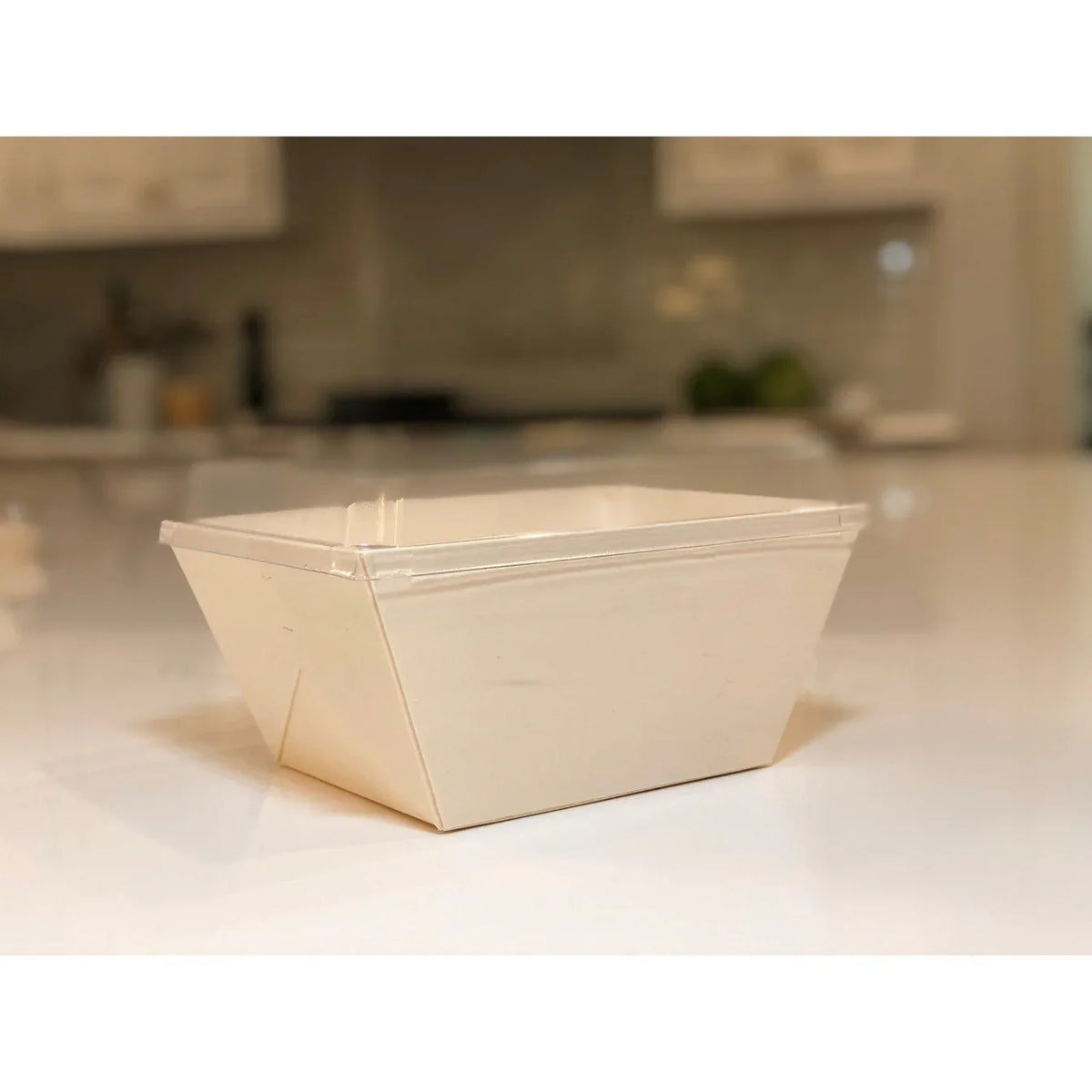 Wood tray with lid on a kitchen counter