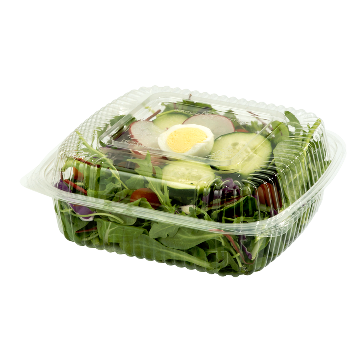 Salad in a clear plastic container with a lid on a white background