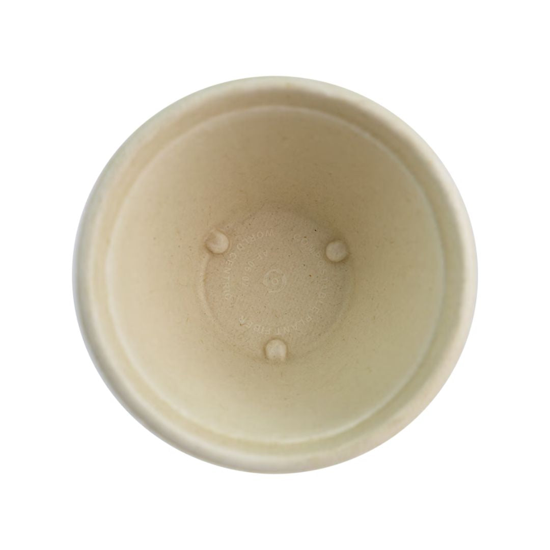 Top view of a compostable natural fiber bowl on a white background