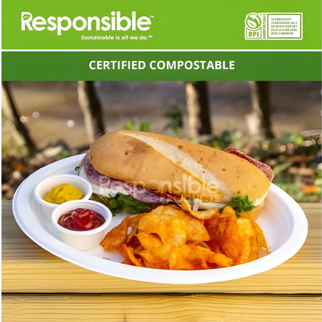 Plated meal with a sandwich and chips on a white compostable plate, branded as 'Responsible' for sustainability.