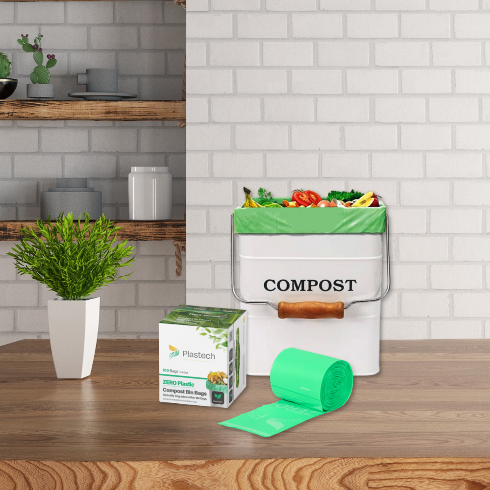Compost bin with compostable products on a kitchen counter