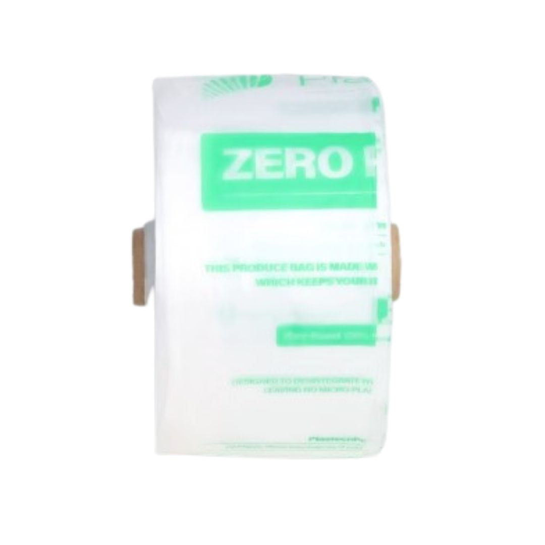 A roll of produce bags with green printed text and a green 'ZERO' label, mounted on brown cardboard spools, shown against a plain white background.