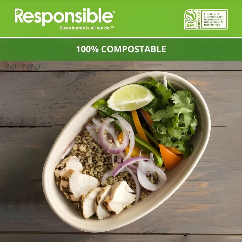 Salad in a bowl with a 'Responsible' label claiming 100% compostable packaging on a wooden surface.