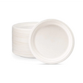 7 inch white circle plate leaning against a stack of white 7" round plates
