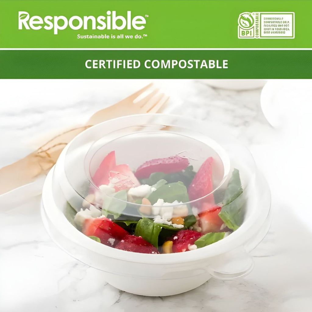 Certified compostable container with salad on a marble surface, branded 'Responsible'.