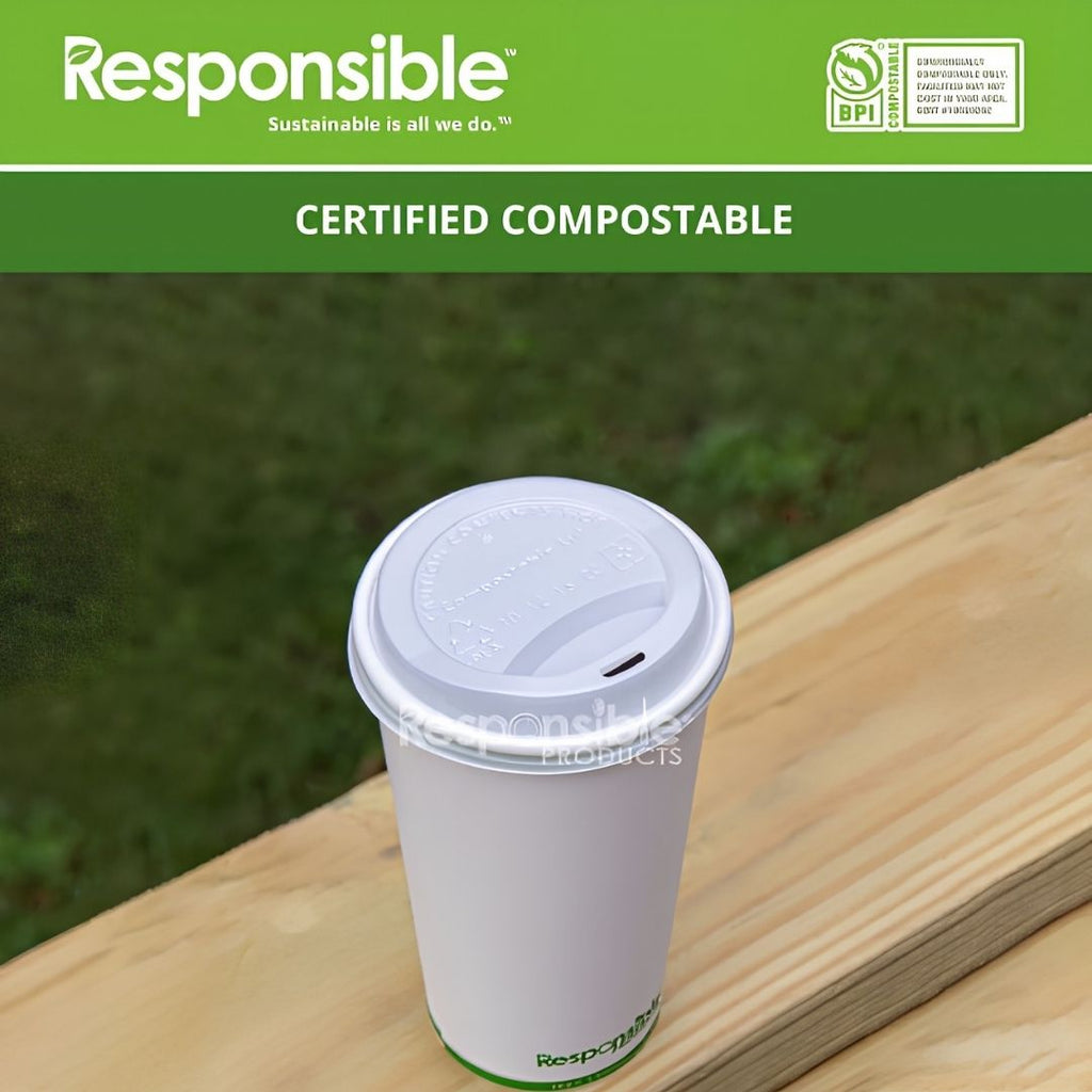 Compostable coffee cup with a compostable hot cup lid on a wooden surface with 'Responsible' branding and certification label.