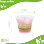 Plastic cup with pink beverage and 'Responsible' branding on a green and white background