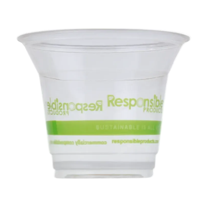 Clear compostable plastic cup with green text on a white background