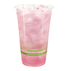 Clear corn plastic cup with pink beverage and ice, labeled 'Responsible' on a white background