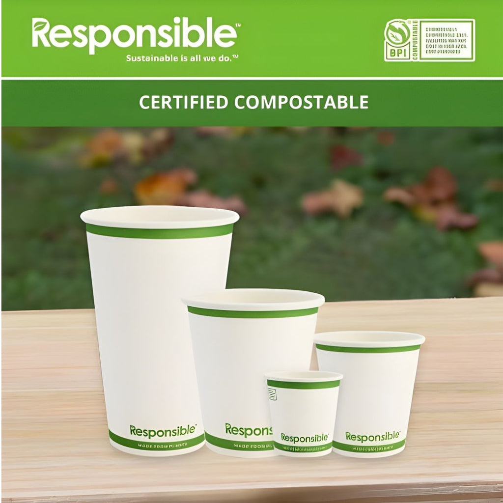 Set of compostable cups with 'Responsible' branding on a wooden surface.