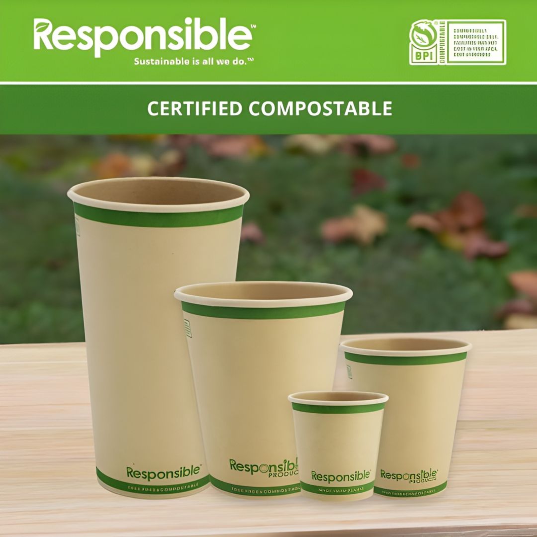 Set of compostable paper cups with 'Responsible' branding on a wooden surface.