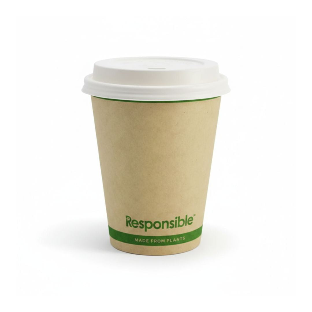 Compostable Paper cup with a white lid and green label on a white background