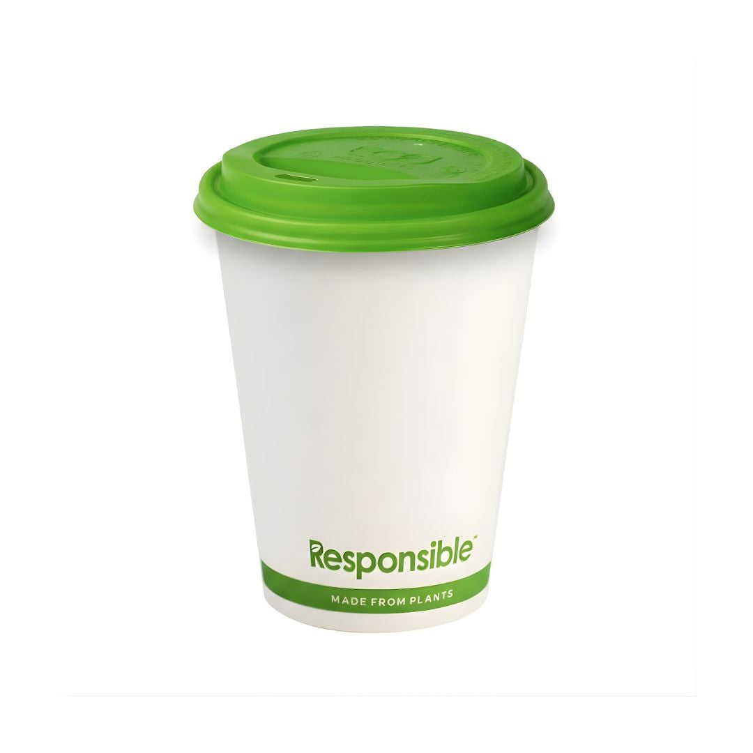 White paper cup with green lid and 'Responsible' branding on a white background