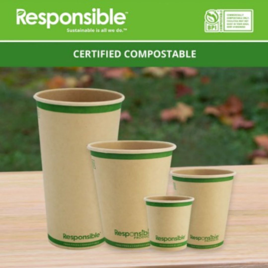 Set of compostable paper cups with 'Responsible' branding on a wooden surface.