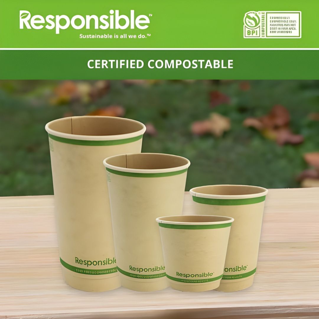Set of compostable paper cups with 'Responsible' branding on a wooden surface.