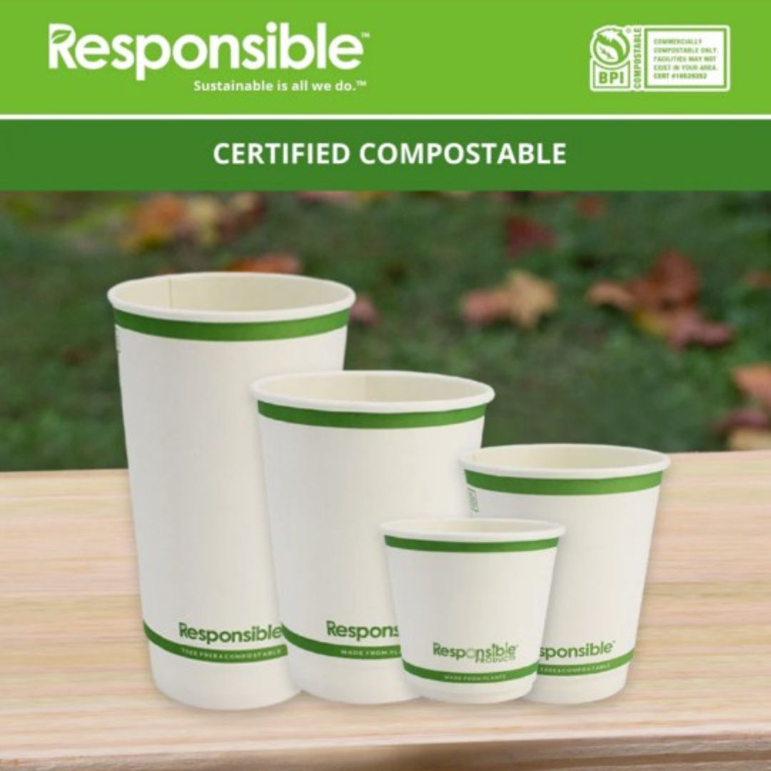 Set of compostable paper cups with 'Responsible' branding on a wooden surface.