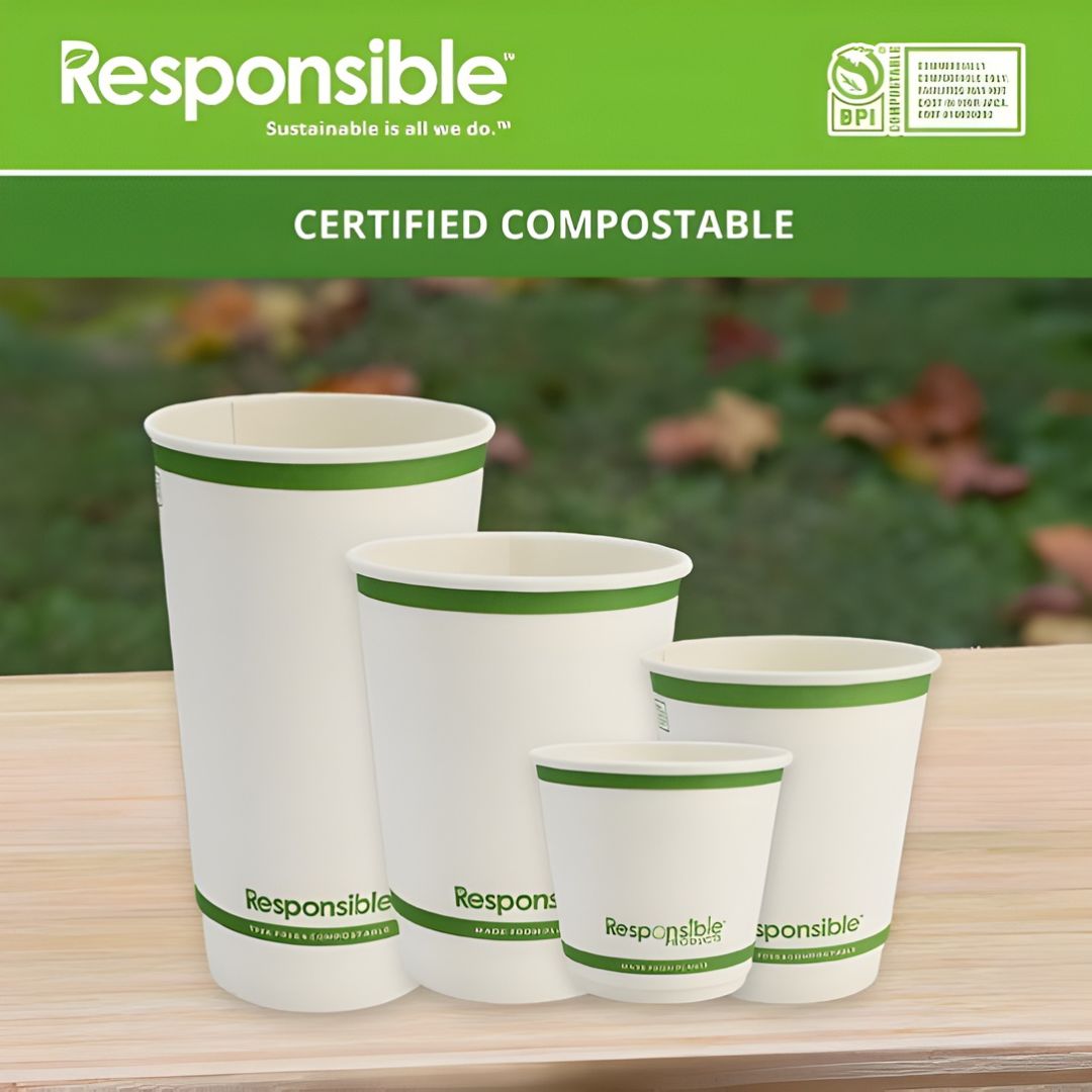 Set of compostable paper cups with 'Responsible' branding on a wooden surface.