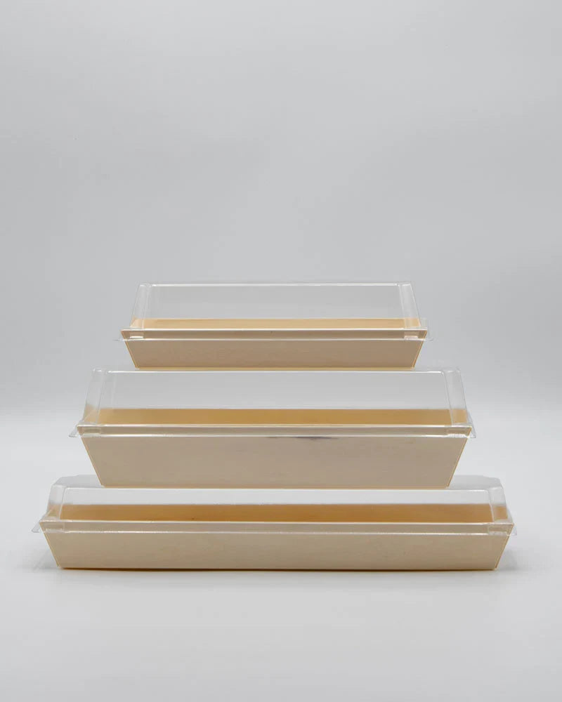 Set of three food containers with clear lids on a light gray background