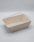 Clear plastic lid on a food box on a white background
